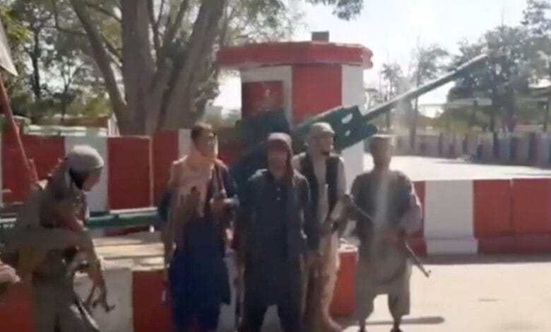 Taliban fighters gather on main road intersection in city of Ghazni, Afghanistan in this screen grab taken from a video released by the Taliban on August 12, 2021. Taliban Handout/via REUTERS