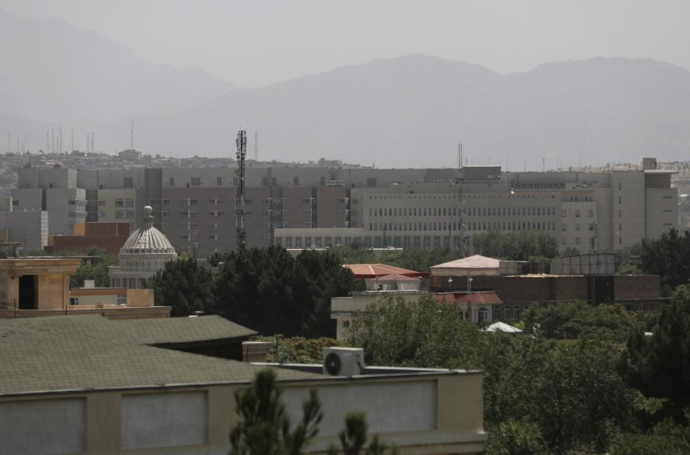 The U.S. Embassy buildings are seen in Kabul, Afghanistan, Saturday, Aug. 14, 2021. The last-minute decision to send 3,000 U.S. troops to Afghanistan to help partially evacuate the U.S. Embassy is calling into question whether President Joe Biden will meet his Aug. 31 deadline for fully withdrawing combat forces. The vanguard of a Marine contingent arrived in Kabul on Friday and most of the rest of the 3,000 are due by Sunday. (AP Photo/Rahmat Gul)