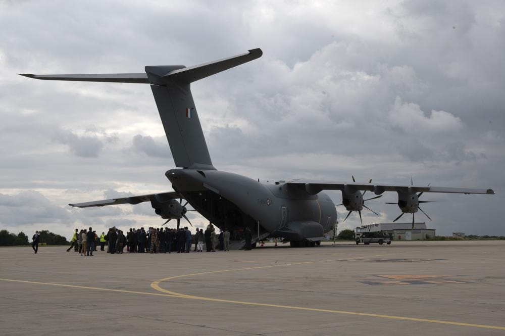 This photo provided by the French Army shows people disembarking from a French military plane on the tarmac of the Villacoublay military base, west of Paris, Sunday, Aug.29, 2021. A military transport aircraft brought home on Sunday French special forces, embassy staff in Kabul and France's ambassador to Afghanistan, David Martinon, along with the last group of Afghan refugees able to make the final evacuation. ( Etat Major des Armees via AP)