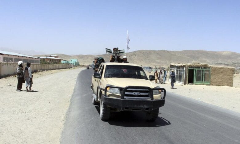 Taliban fighters patrol inside the city of Ghazni, southwest of Kabul, Afghanistan, Friday, Aug. 13, 2021. The Taliban have completed their sweep of the country’s south on Friday, as they took four more provincial capitals in a lightning offensive that is gradually encircling Kabul, just weeks before the U.S. is set to officially end its two-decade war. (AP Photo/Gulabuddin Amiri)