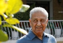 Nuclear scientist Abdul Qadeer Khan smiles at the media after his court verdict outside his residence in Islamabad February 6, 2009. REUTERS/Mian Khursheed