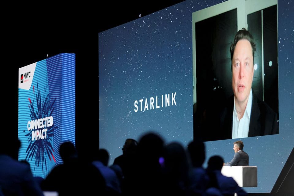 SpaceX founder and Tesla CEO Elon Musk speaks on a screen during the Mobile World Congress (MWC) in Barcelona, Spain, June 29, 2021. REUTERS/Nacho Doce