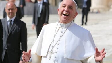 Pope_Francis_laughing_outside_of_St_Peters_Basilica_during_the_general_audience_on_April_1_2015_Credit_Bohumil_Petrik_CNA_4_1_15