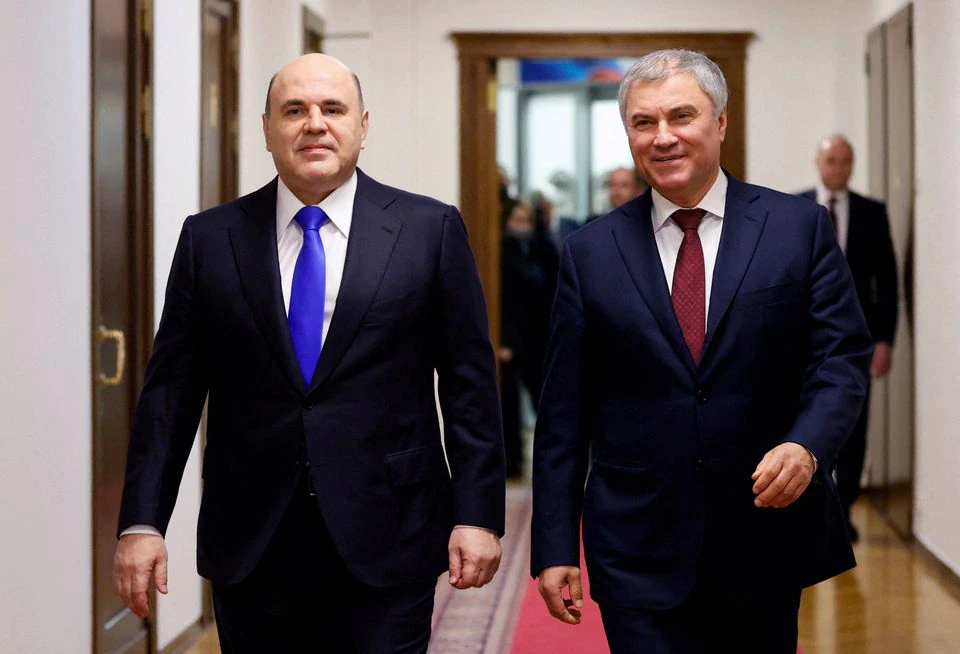 Russia's Prime Minister Mikhail Mishustin + Vyacheslav Volodin, April 7, 2022. Sputnik Dmitry Astakhov REUTERS