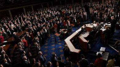 Members of the 118th Congress raise their right hands as they are sworn into office to serve in the U.S. House of Representatives on the fourth day of Congress at the U.S. Capitol in Washington, U.S., January 7, 2023. REUTERS/Jon Cherry