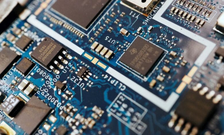 Semiconductor chips are seen on a circuit board of a computer in this illustration picture taken February 25, 2022. REUTERS Florence Lo