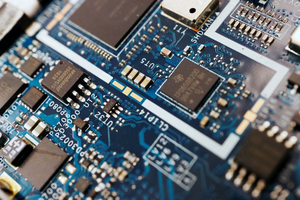 Semiconductor chips are seen on a circuit board of a computer in this illustration picture taken February 25, 2022. REUTERS Florence Lo